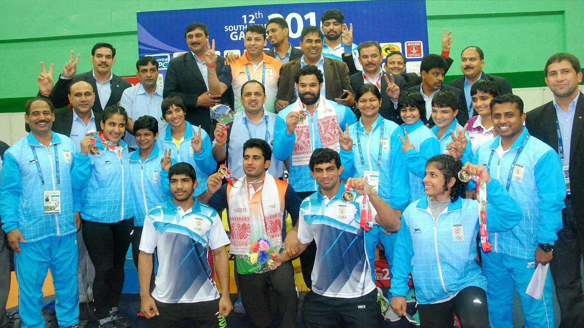 The Indian Wrestling contingent with their medals after the completion of their events. (Photo: PTI)