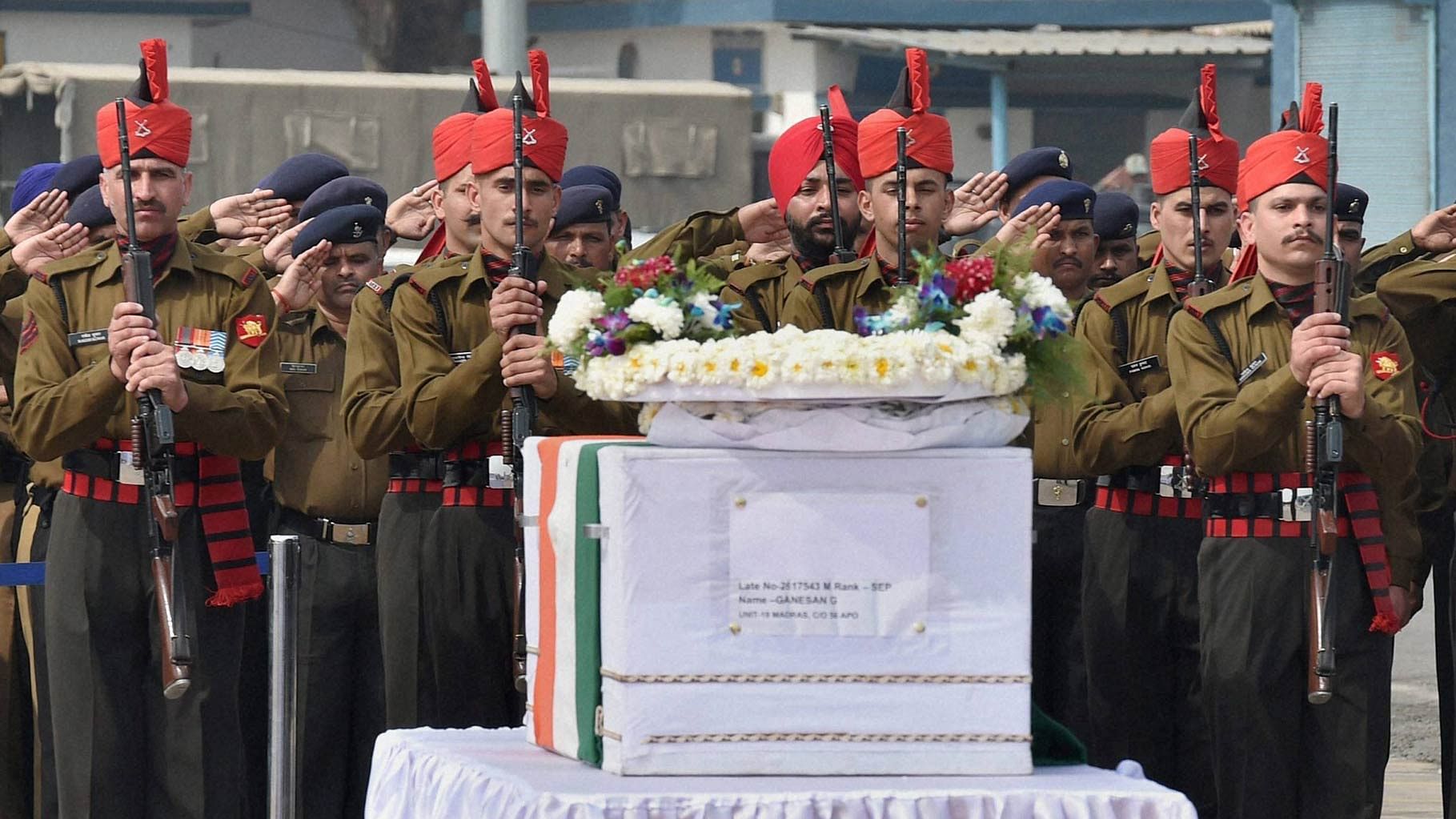 Jawans pay  last respects to the mortal remains of Siachen avalanche victims  at Air Force Station, Palam in New Delhi on 15 February 2016. (Photo: PTI)