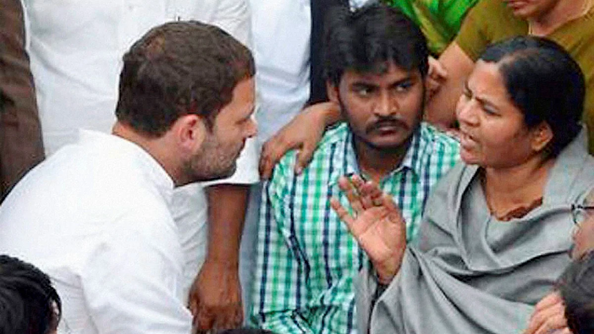 Rahul Gandhi with Rohith Vemula’s mother. (Photo: PTI)