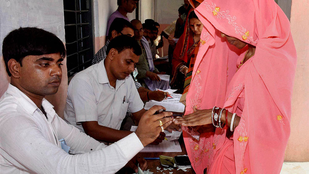 Representational image of people registering their votes. (Photo: PTI)