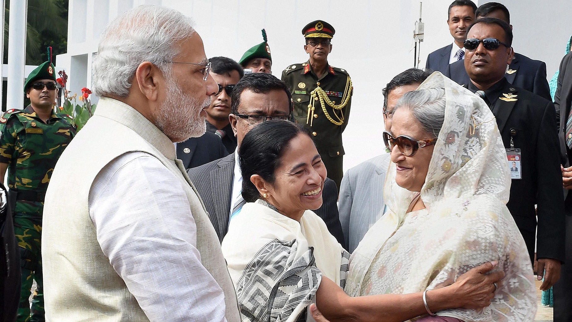 In this file photo, Prime Minister Narendra Modi looks on as
Bangladesh Prime Minister Sheikh Hasina and West Bengal Chief Minister Mamata
Banerjee hug each other at the flag off ceremony of bus services between
Bangladesh and India. (Photo: PTI) &nbsp; &nbsp; &nbsp;