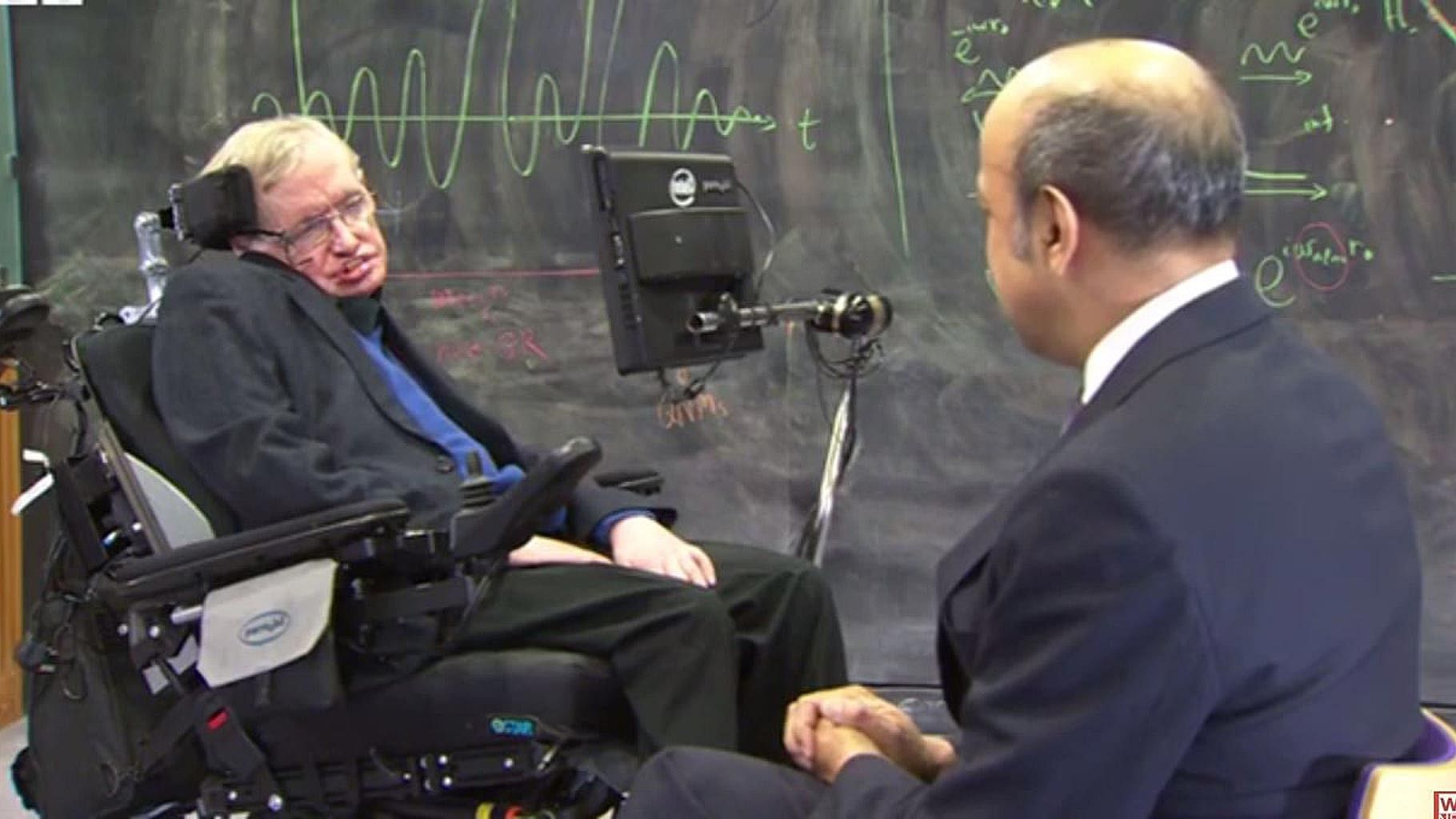 Professor Stephen Hawking talking to <i>BBC</i>’s Pallab Ghosh about gravitational waves. (Photo Courtesy: Youtube Screengrab)