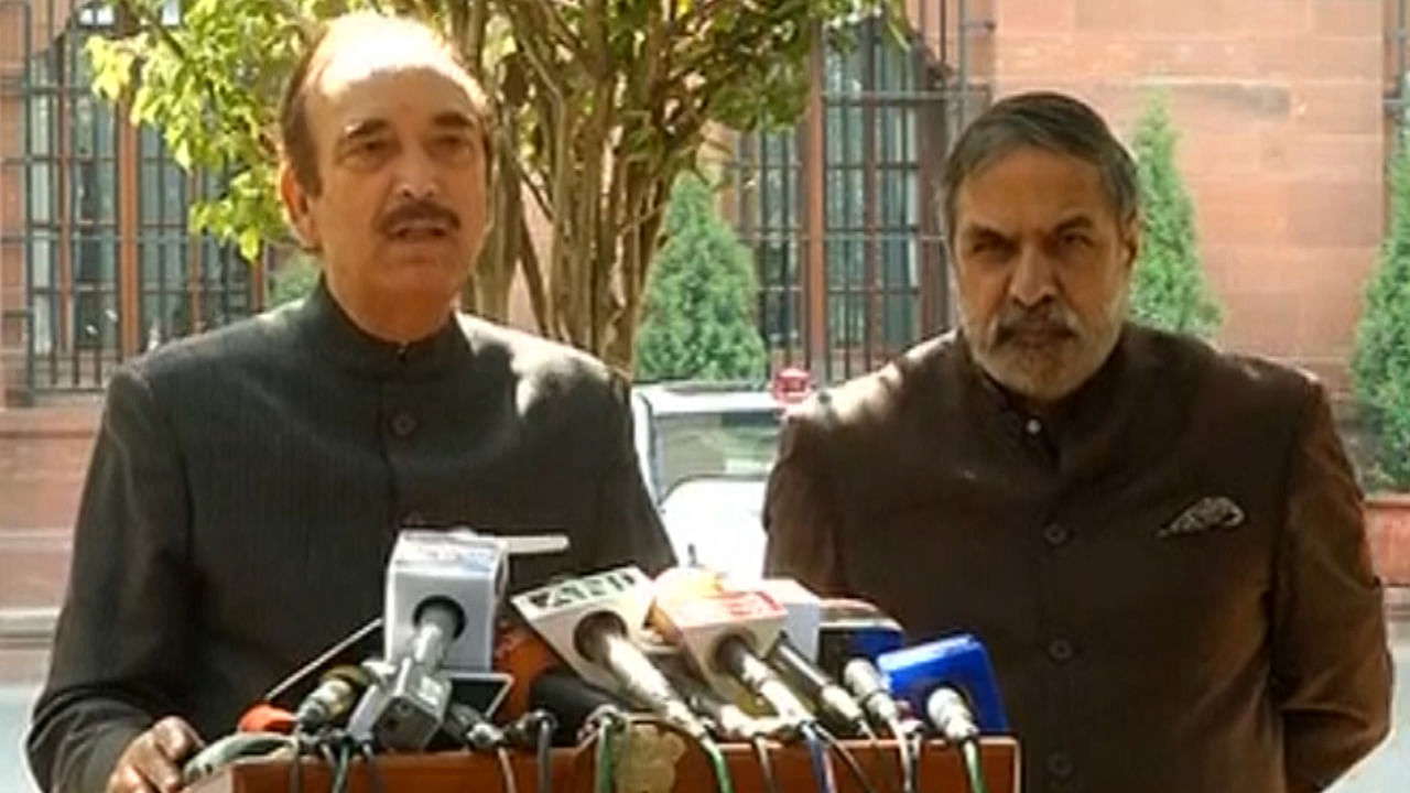 Congress leaders Ghulam Nabi Azad (left) and Anand Sharma (right) speaking to the media after the Opposition leaders met the Prime Minister in New Delhi on Tuesday. (Photo: ANI screengrab)