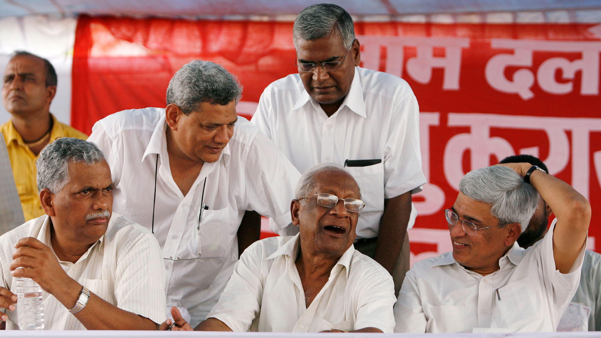 File Photo: (L to R) Senior communist leaders Debabrata Biswas, Sitaram Yechury, the late AB Bardhan, D. Raja (standing) and Prakash Karat (Photo: Reuters) 