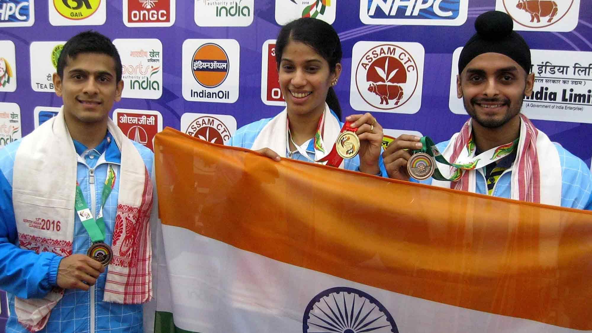 Saurav Ghosal (Bronze), Joshana Chinappa (Gold), Harinder Pal Sandhu (Bronze) stand with their medals  at the 12th South Asian Games. (Photo: IANS)