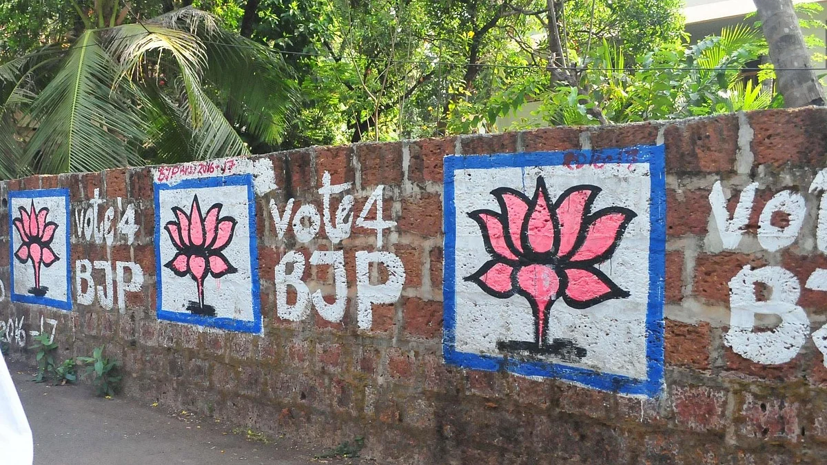 BJP graffitis on a wall in Kannur of Kerala ahead of state assembly polls on March 15, 2016. (Photo: IANS)