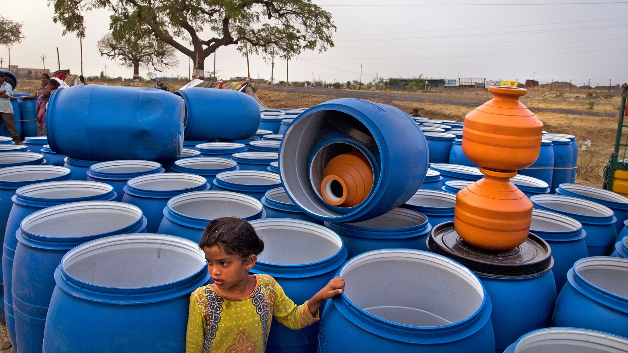 

Barrels for water storage. (Photo Courtesy: Subrata Biswas/Greenpeace)