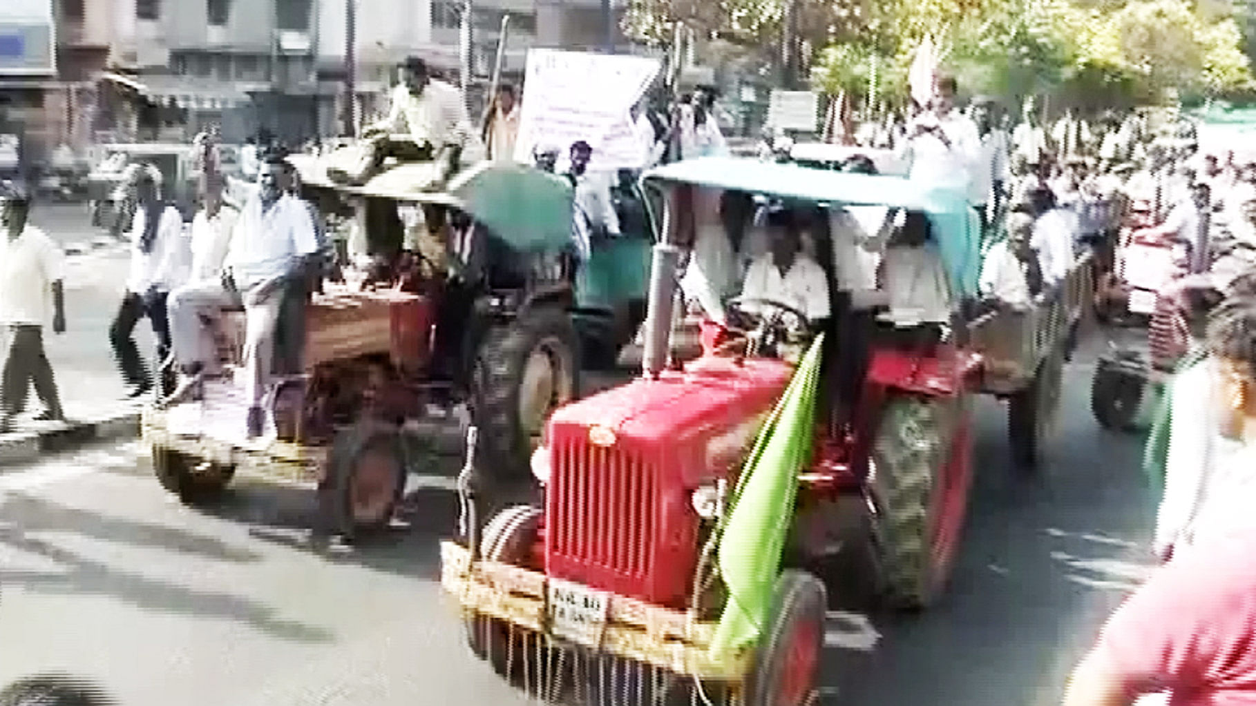 Farmers drove their tractors into the city. (Photo: ANI)