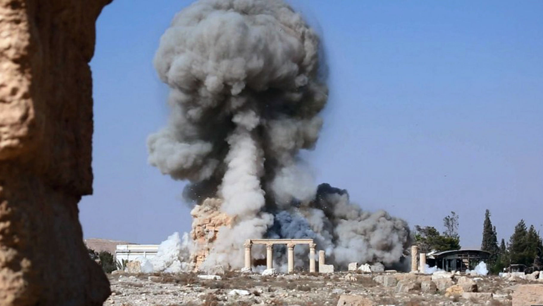 The picture shows smoke from the detonation of the 2,000-year-old temple of Baalshamin in Syria’s ancient caravan city of Palmyra. (Photo: AP)