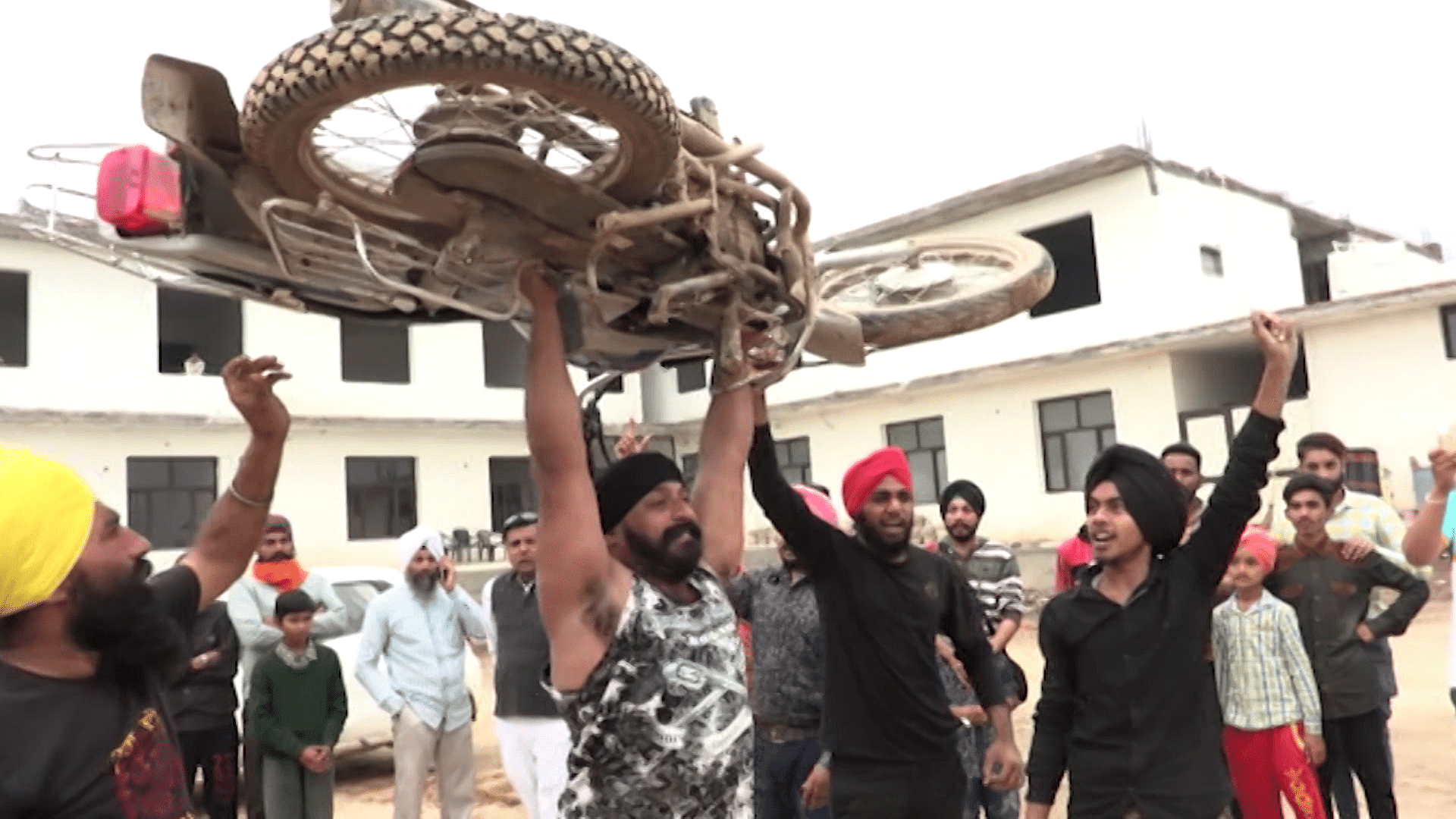 Amandeep Singh from Kurukshetra, Haryana, can withstand being run over,  lift a motorbike above his head and smash metal bars across his chest. (Photo: AP/Caters News screengrab)