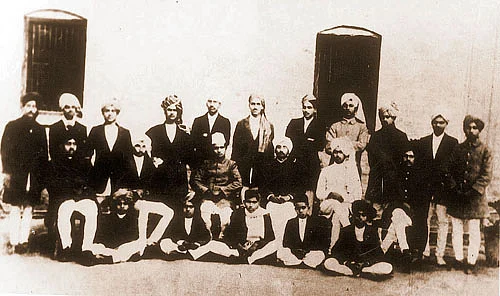 In this historical photograph of students and staff of National College, Lahore, Singh can be seen standing fourth from the right. (Photo courtesy: Wikimedia Commons