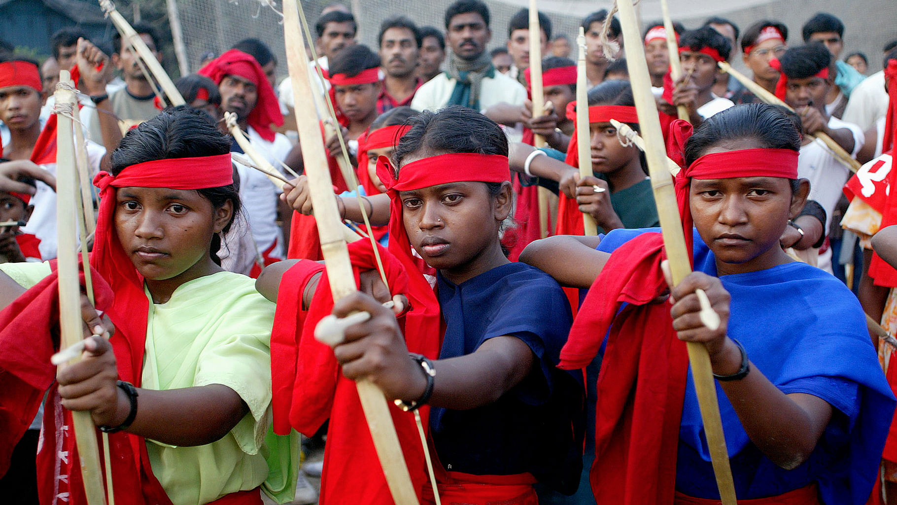 File photos of Naxalites posing with bows and arrows during a rally. (Photo: Reuters)
