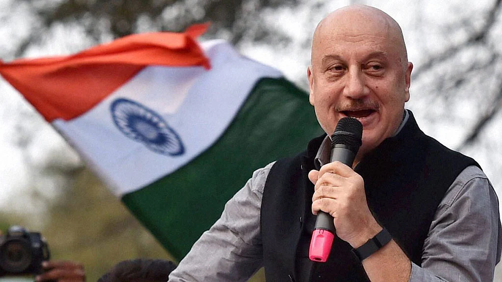 Bollywood actor Anupam Kher addresses students before the screening of his film <i>Buddha in a Traffic Jam,</i> at JNU.