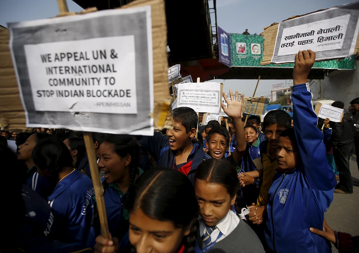 Nepalese students holding placards take part in a protest to show solidarity against the border blockade in Kathmandu, Nepal November 27, 2015. (Photo: Reuters/Navesh Chitrakar)