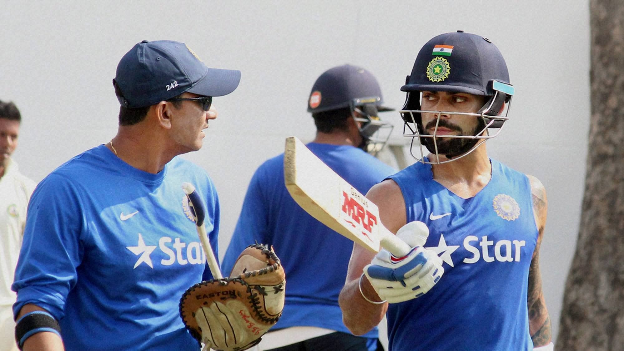 <div class="paragraphs"><p>File image: Virat Kohli with assistant coach Sanjay Bangar.</p></div>