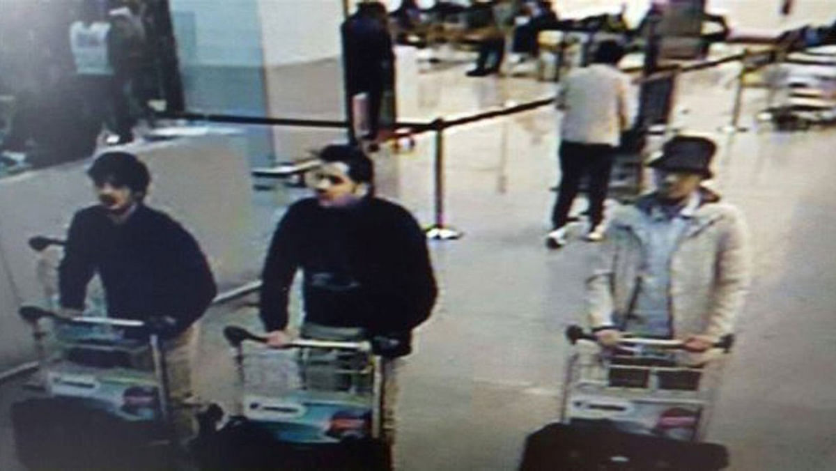 The Brussels airport attacker still at large has been identified as 25 year old Najim Laachraoui.