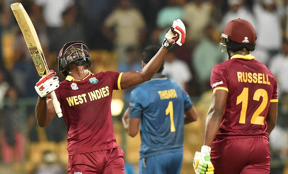 West Indies Andre Fletcher and Andre Russell celebrate the win over Sri Lanka. (Photo: PTI)