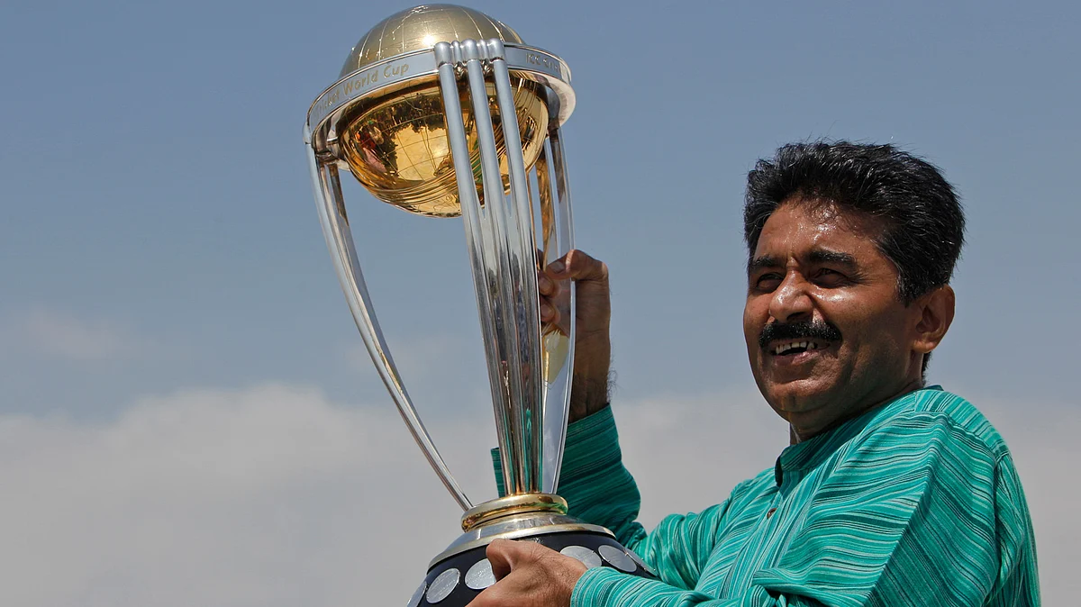 Former Pakistani cricketer Javed Miandad with the World Cup trophy. 