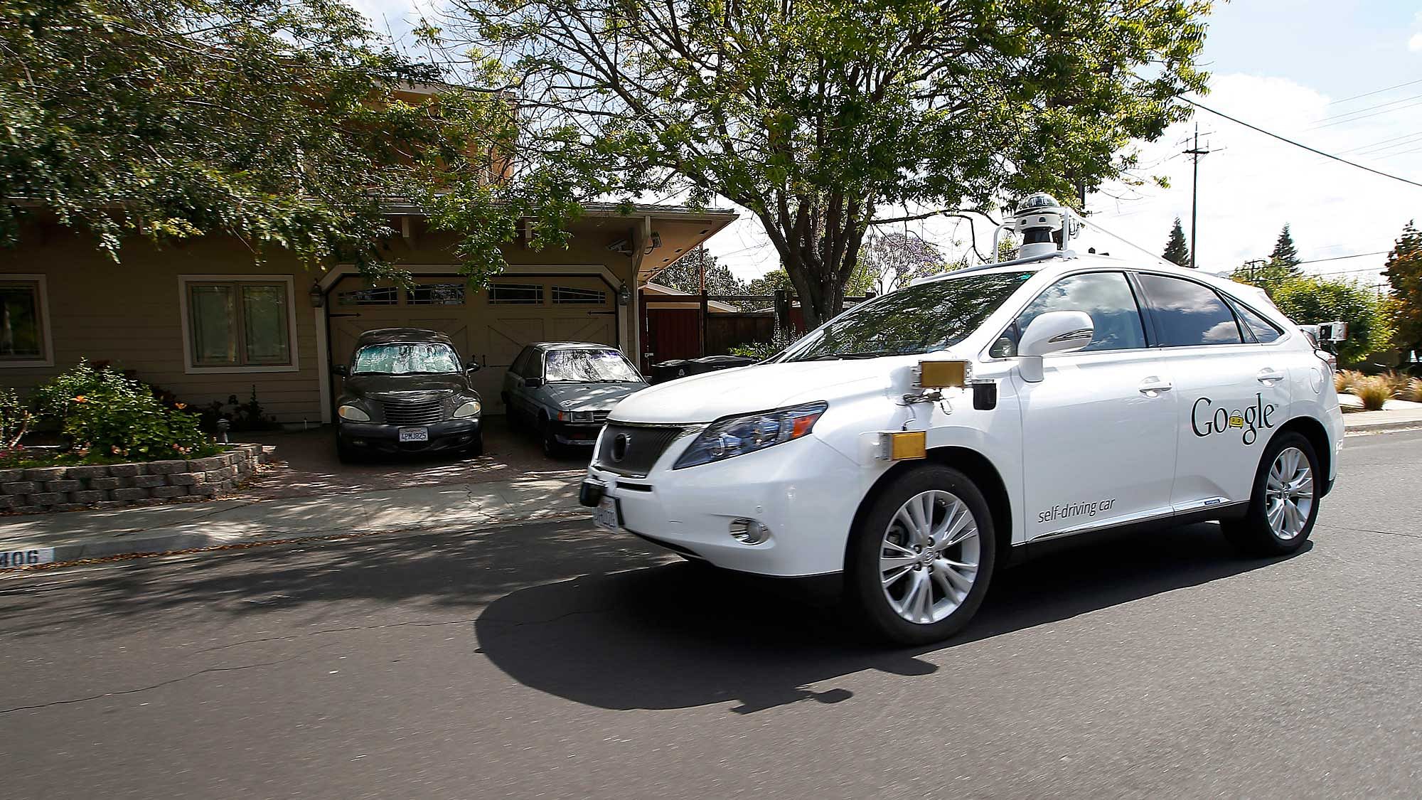 Google’s self-driving Lexus car drives along street during a demonstration at Google campus on in Mountain View, California. (Photo: AP)   