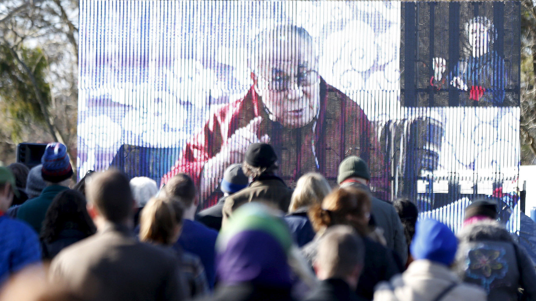 Exiled Tibetan spiritual leader the Dalai Lama is pictured live on a giant screen. (Photo: Reuters)