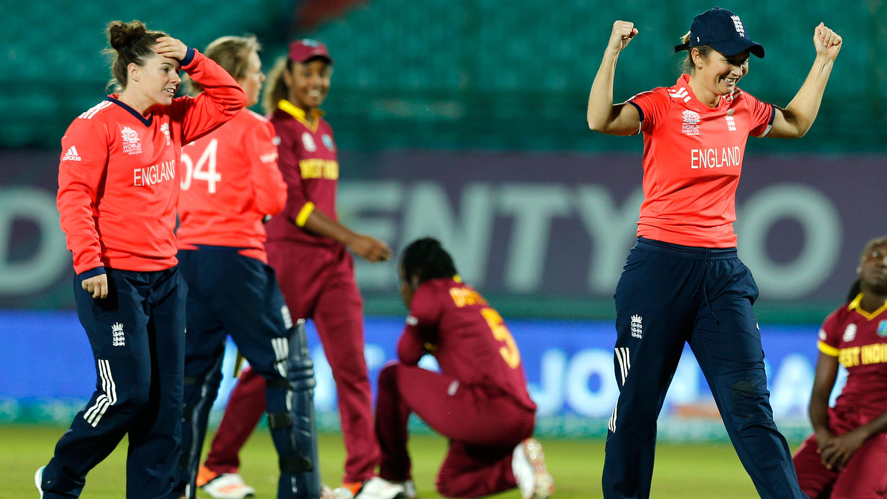  England’s captain  Charlotte Edwards, right, celebrates after winning their match against the West Indies. (Photo: AP)
