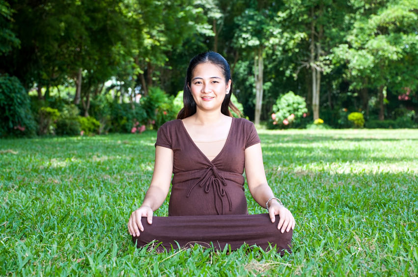 Avoid fitted yoga clothes that may cause discomfort. (Photo: iStock)