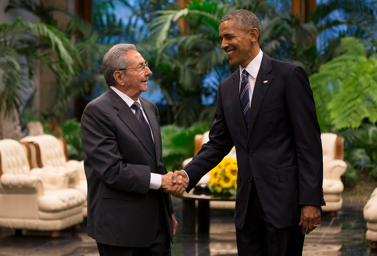 Barack Obama and Raul Castro vow  to work together despite differences between in a stunning diplomatic display