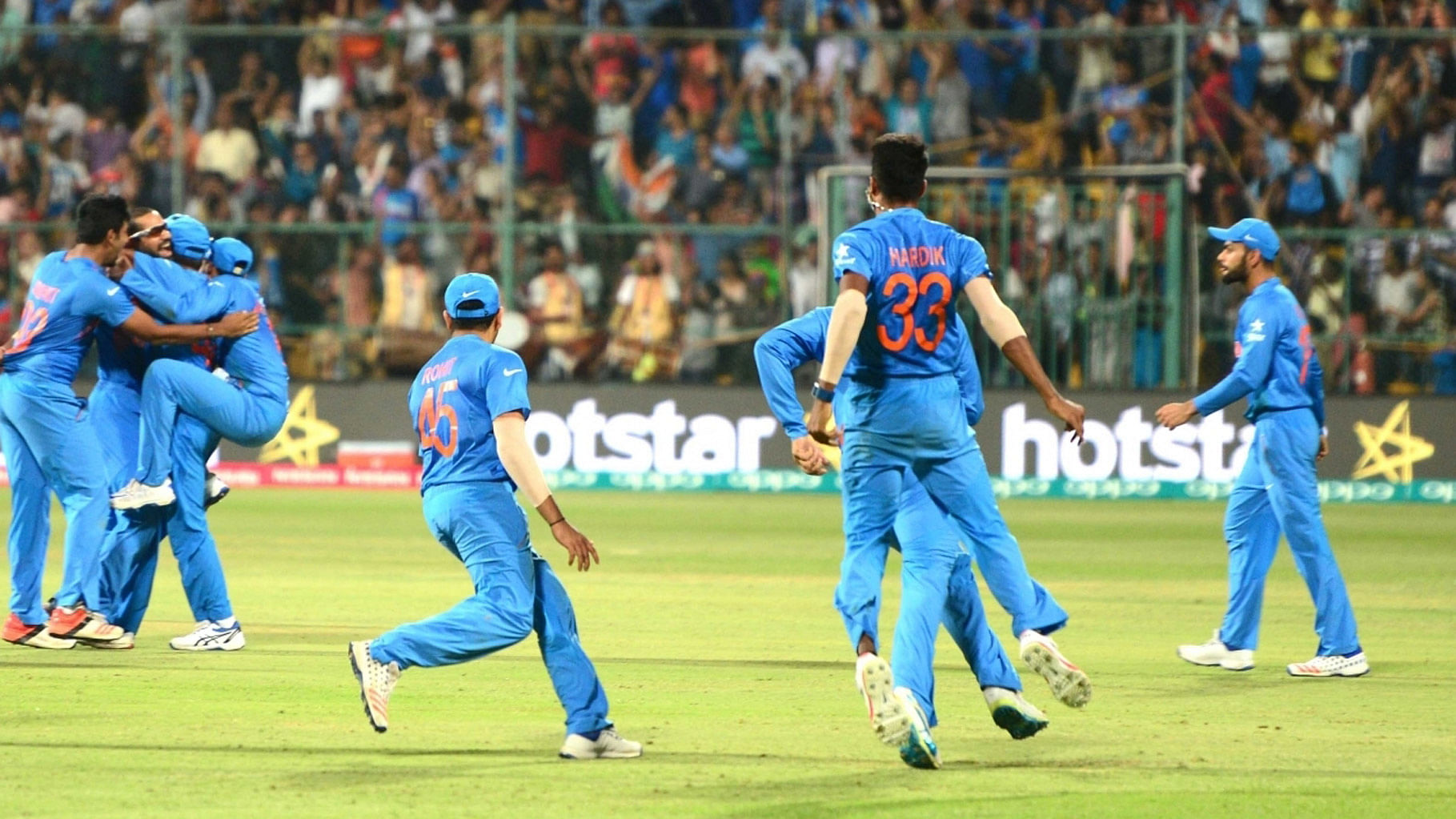 The Indian team celebrates after beating Bangladesh by one run. (Photo: IANS)
