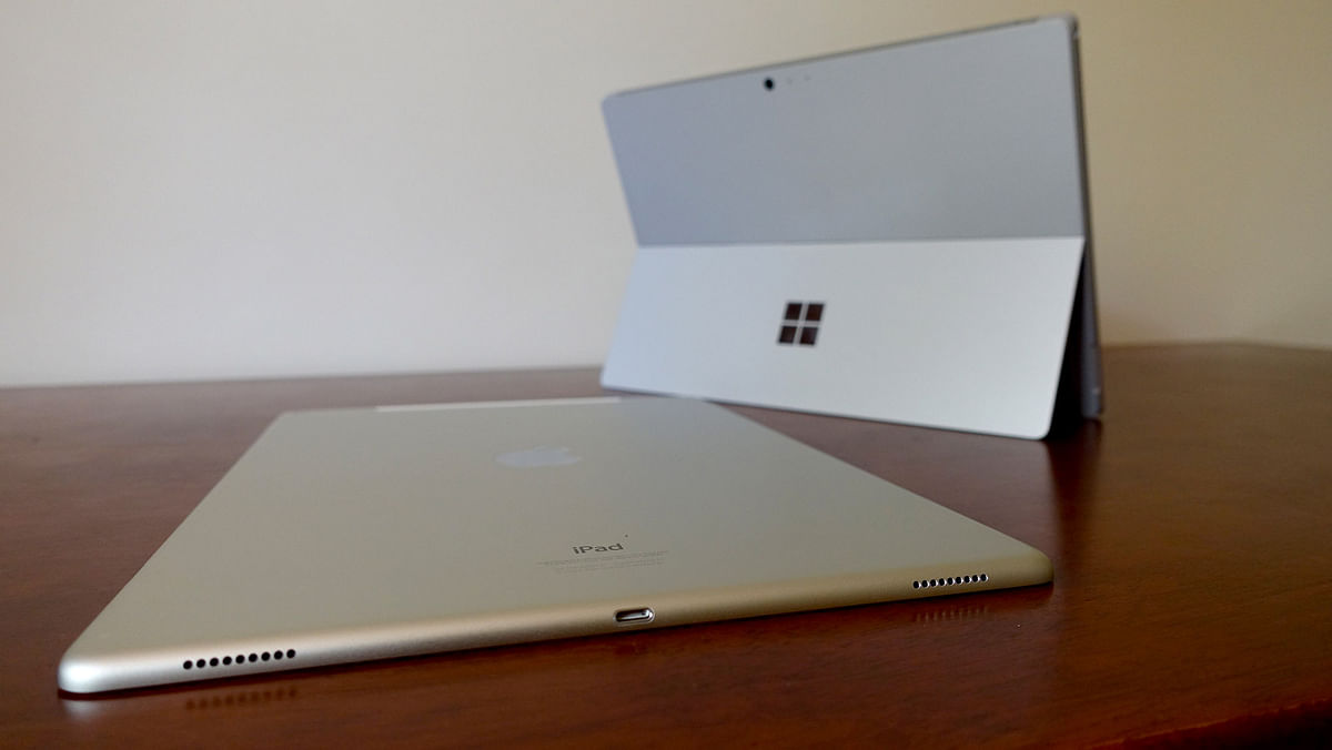 We pit the Apple and Microsoft 2-in-1 PCs vying for space in the laptop segment.