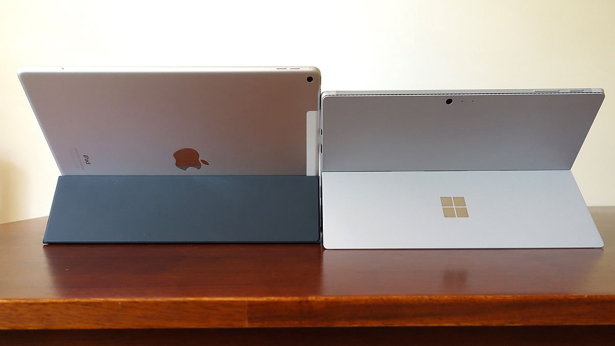 We pit the Apple and Microsoft 2-in-1 PCs vying for space in the laptop segment.