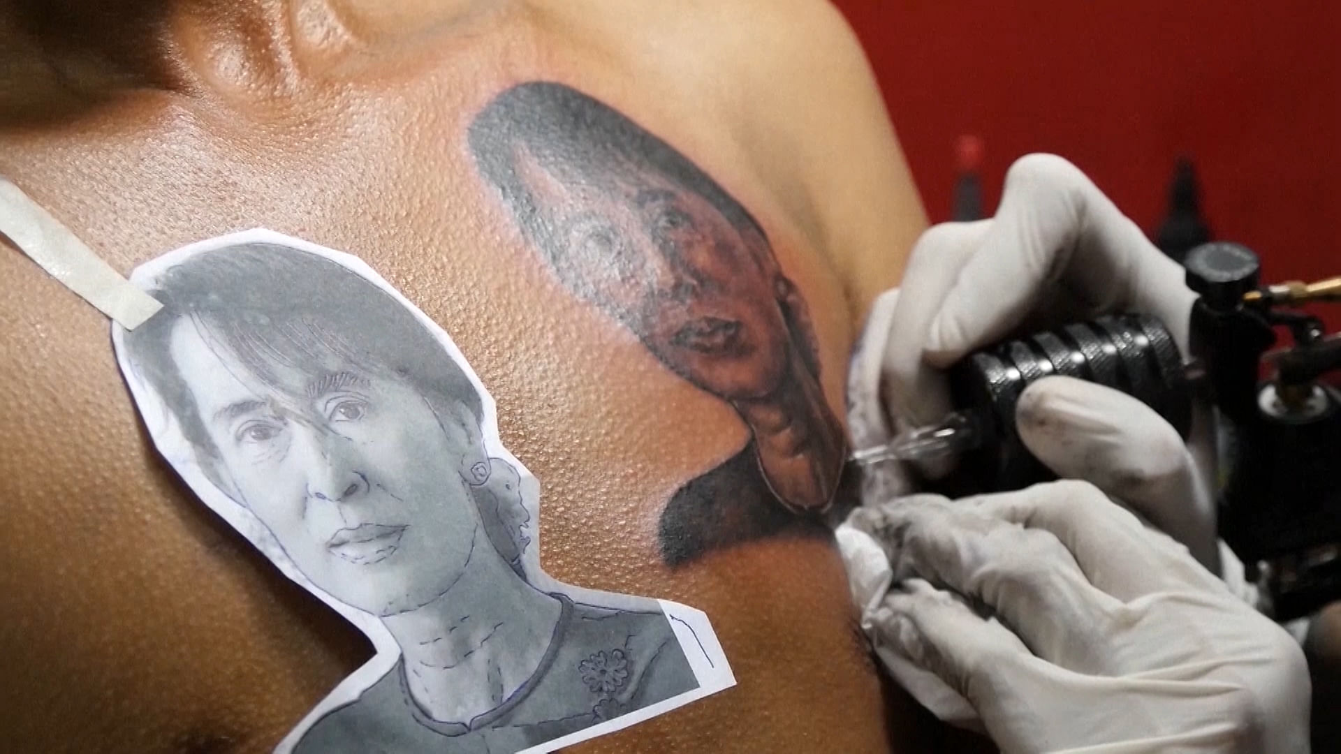 Aung San Suu Kyi’s landslide victory in November elections last year has increased the number of people who want to get her tattoo. (Photo: AP Screengrab)