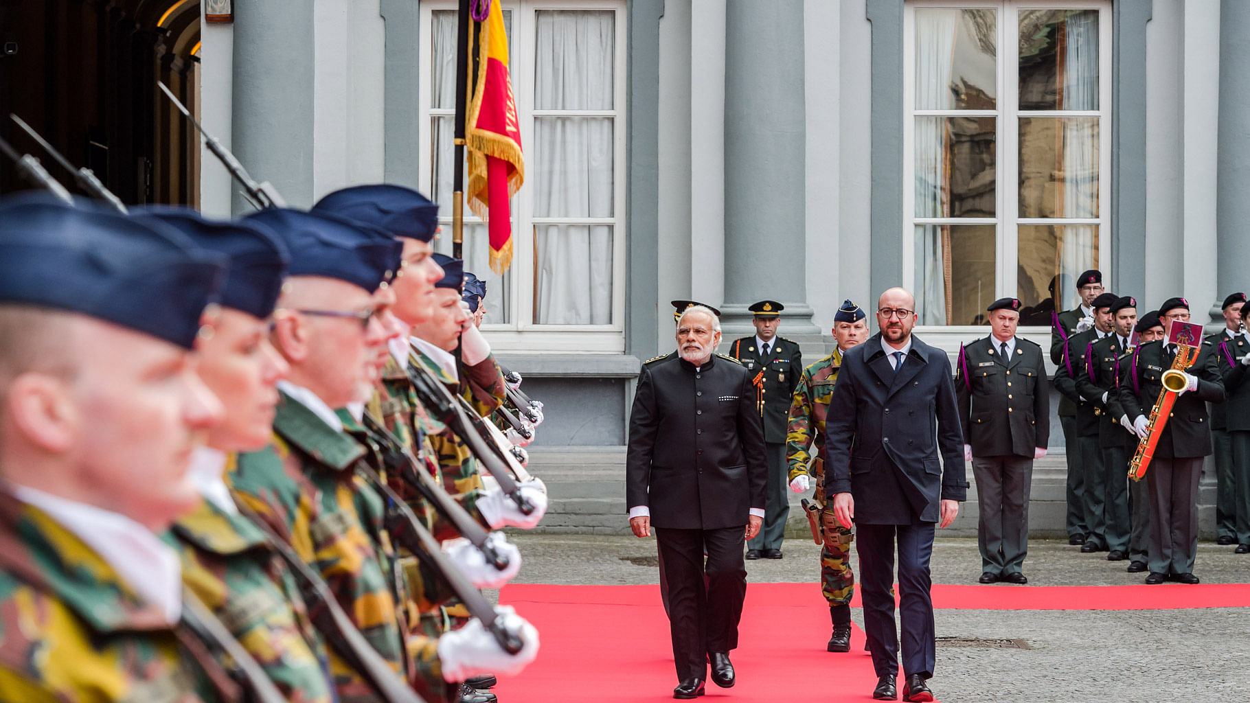 

Belgian  Prime Minister Charles Michel, right, and  Prime Minister Narendra Modi at a ceremonial guard of honour  prior to a meeting at the Egmont Palace in Brussels,  March 30, 2016. (Photo: AP)
