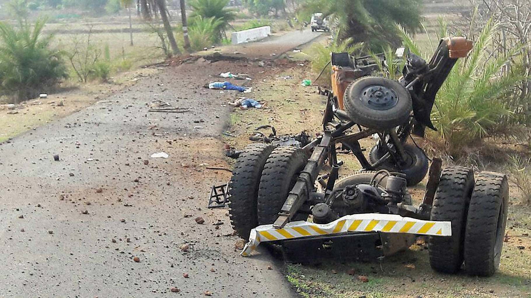 Mangled remains of a CRPF vehicle after a Naxal attack on a CRPF convoy in Dantewada on Wednesday, 30 March 2016. (Photo: PTI)