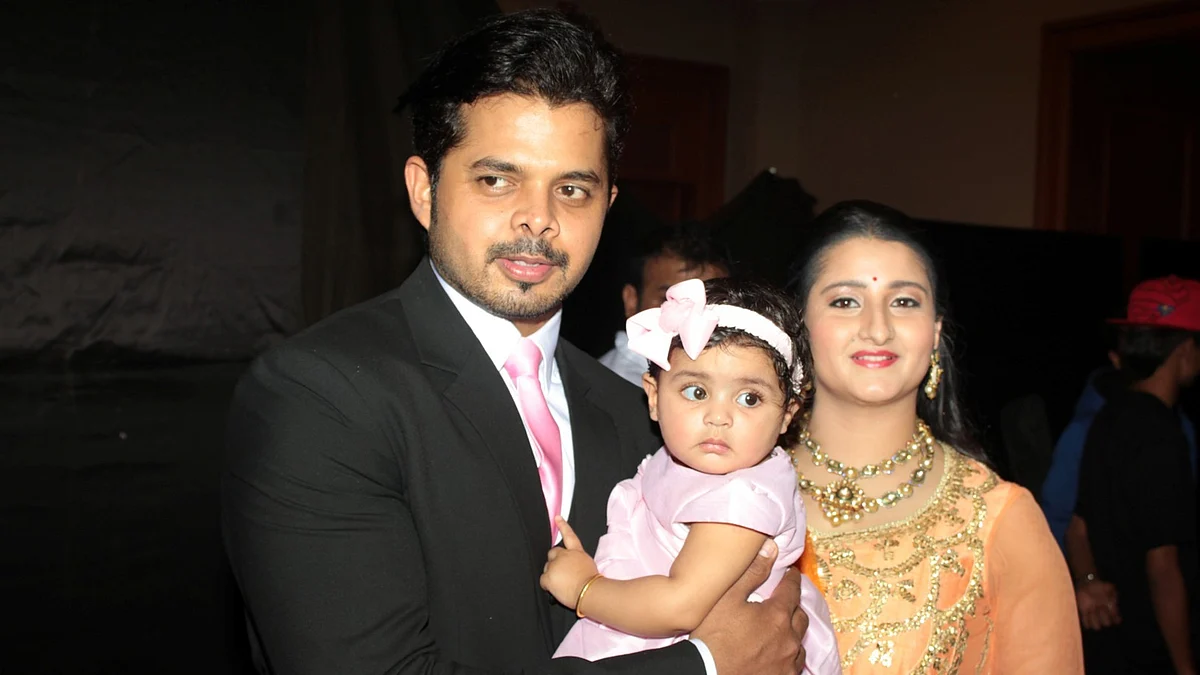 File picture of S Sreensath with his wife and daughter. 