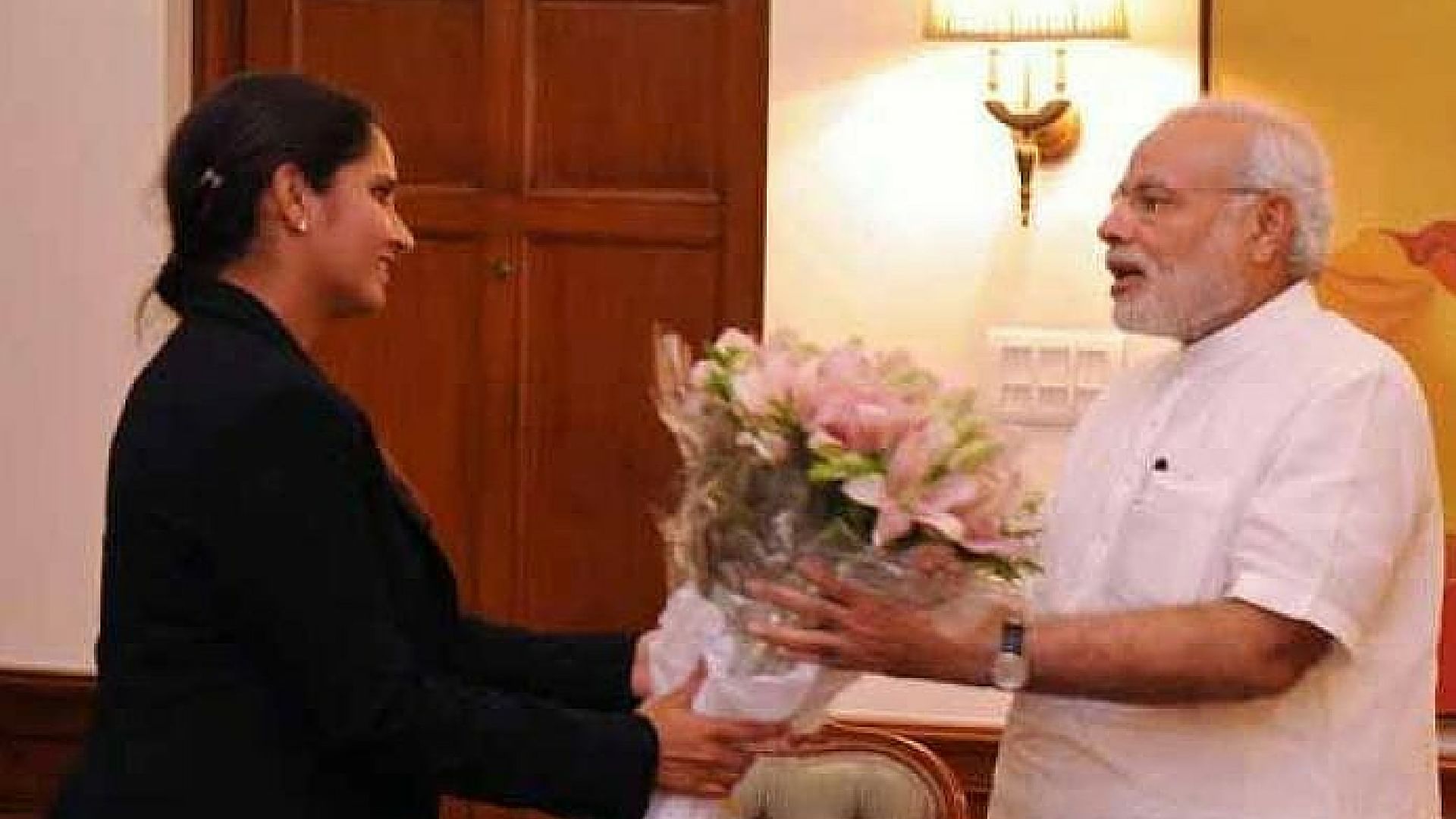 

Sania Mirza with Narendra Modi after she won the US Open Title. (Photo: PTI)