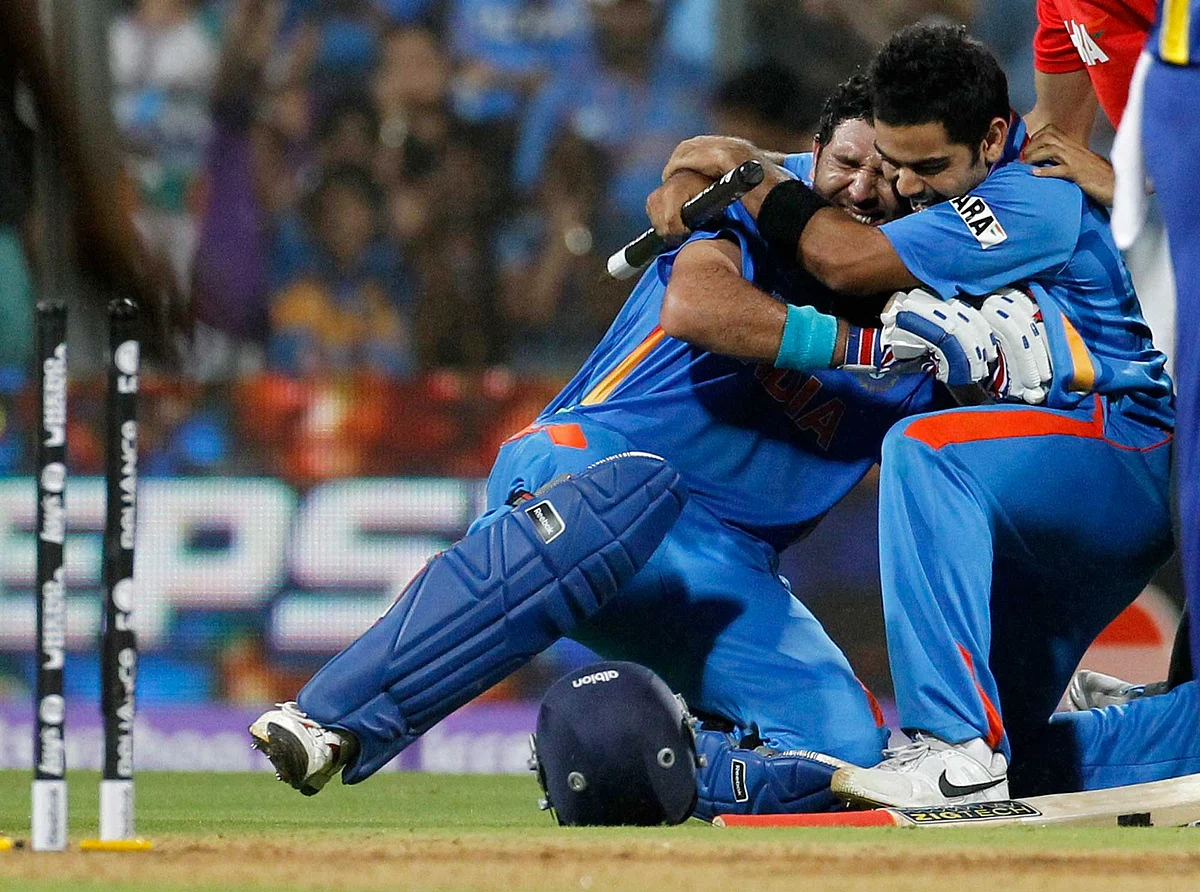 Yuvraj Singh (L) and Virat Kohli celebrate after defeating Sri Lanka in the 2011 ICC World Cup final. (Photo: Reuters)