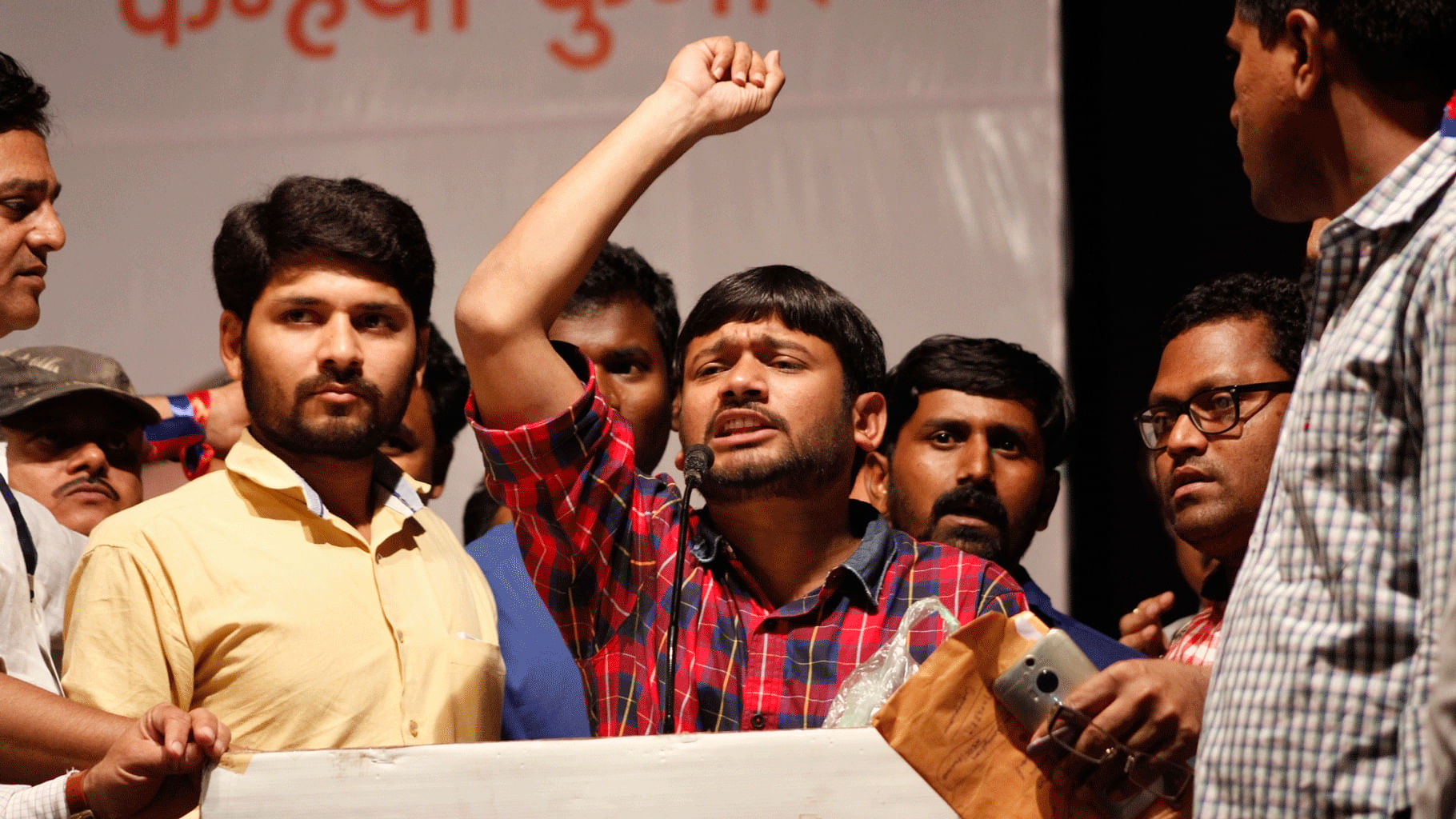 Kanhaiya Kumar addresses a gathering in Pune; he alleged that he was assaulted by a BJP supporter on his way to the meeting. (Photo: IANS)