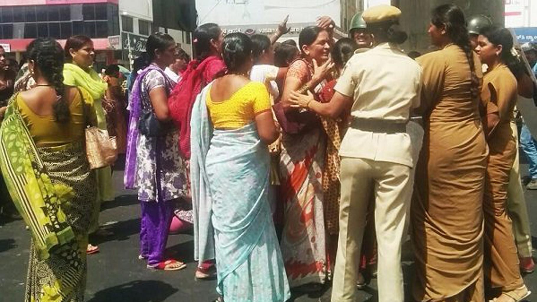 Clash between police and garment factory workers protesting against PF rules. (Photo: The News Minute)