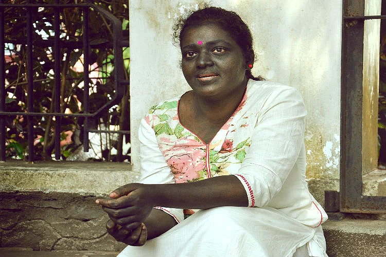 Jaya is protesting against the ‘is dark, must be a Dalit’ mindset. (Photo Courtesy: <i>The News Minute</i>)