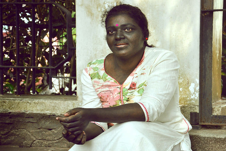 Kerala artist paints herself black with grease to fight the ‘is dark, must be Dalit’ mindset.