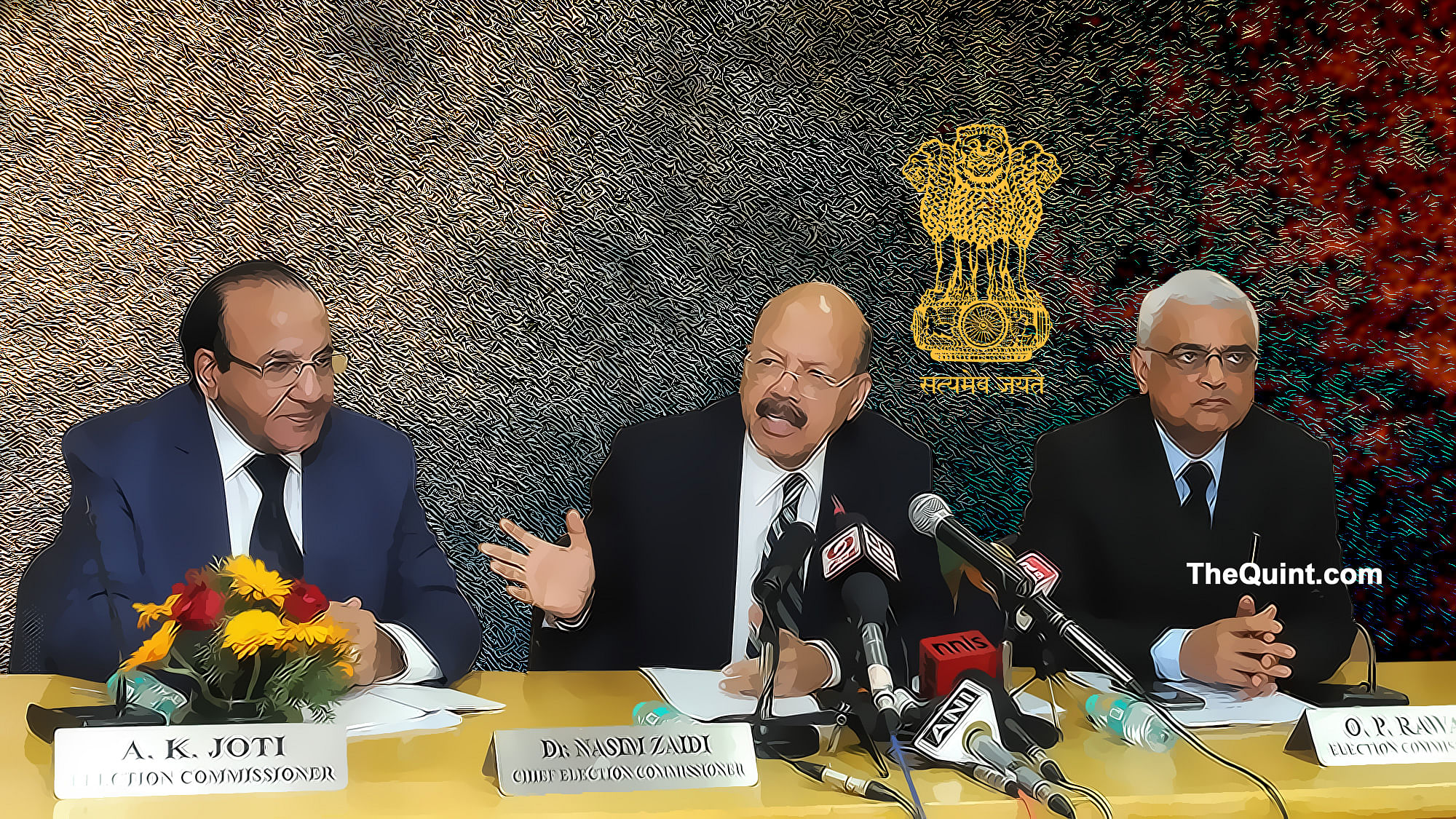 Chief Election Commissioner, Dr. Nasim Zaidi addresses a press conference, in New Delhi on 4 March 4, 2016. Also seen Election Commissioners A.K. Joti and O.P. Rawat.  (Photo: IANS/ Altered by <b>The Quint</b>)