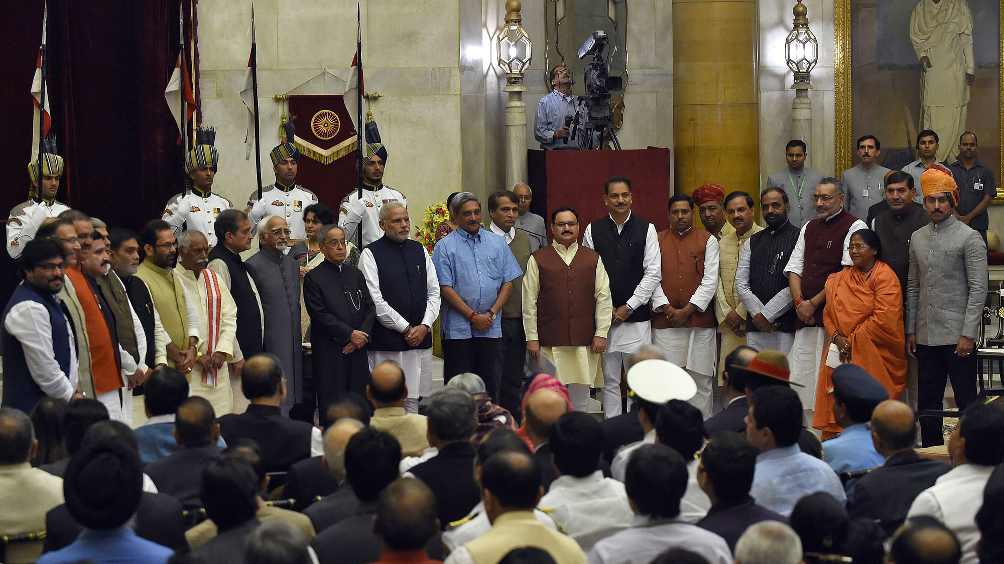 Prime Minister Narendra Modi poses with cabinet ministers after the swearing-in ceremony at the presidential palace in New Delhi, November, 2014. (Photo: Reuters)
