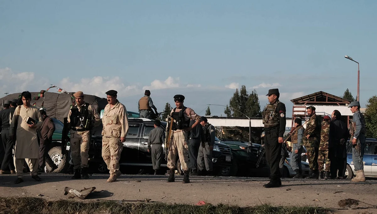File photo: Afghan security force members inspecting the site of a suicide attack in Nangarhar province, eastern Afghanistan on Monday, 11 April 2016. (Photo: IANS)