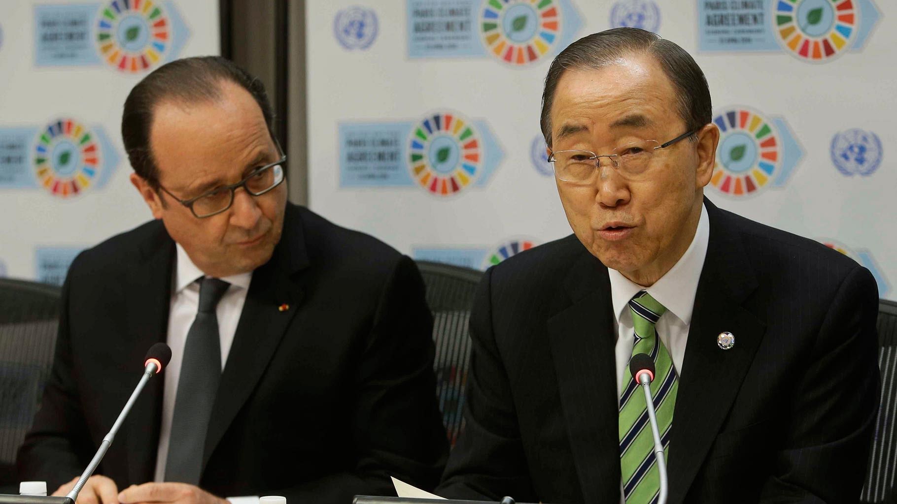 Francois Hollande, President of France( left), listens as Secretary General Ban Ki-moon, (right), speaks during a news conference Friday at the United Nations headquarters. (Photo: AP)
