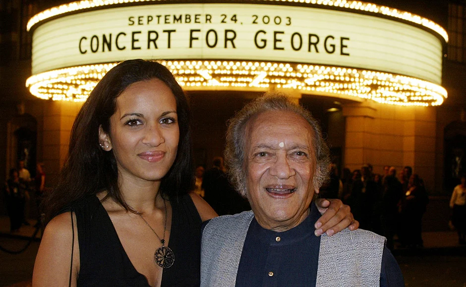 Musician Ravi Shankar (R) and daughter Anoushka Shankar
arrive for a screening of <i>Concert for George</i>, a new documentary
film celebrating the music of George Harrison. (Photo: Reuters)