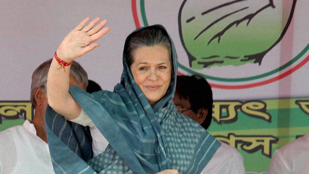 Congress President Sonia Gandhi addresses a rally in Malda district of the state. (Photo: PTI)