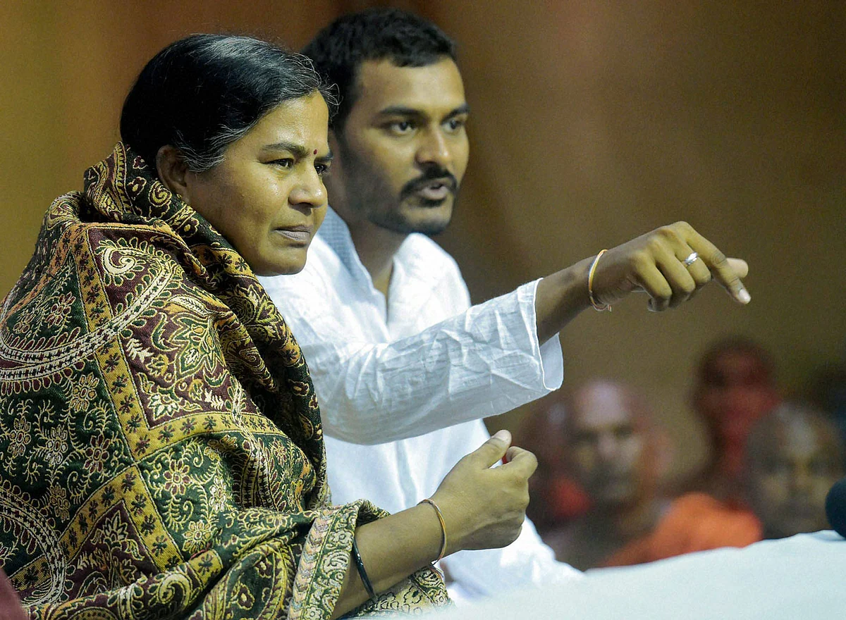 Rohith Vemula’s mother Radhika Vemula and his brother Raja Vemula.(Photo: PTI)