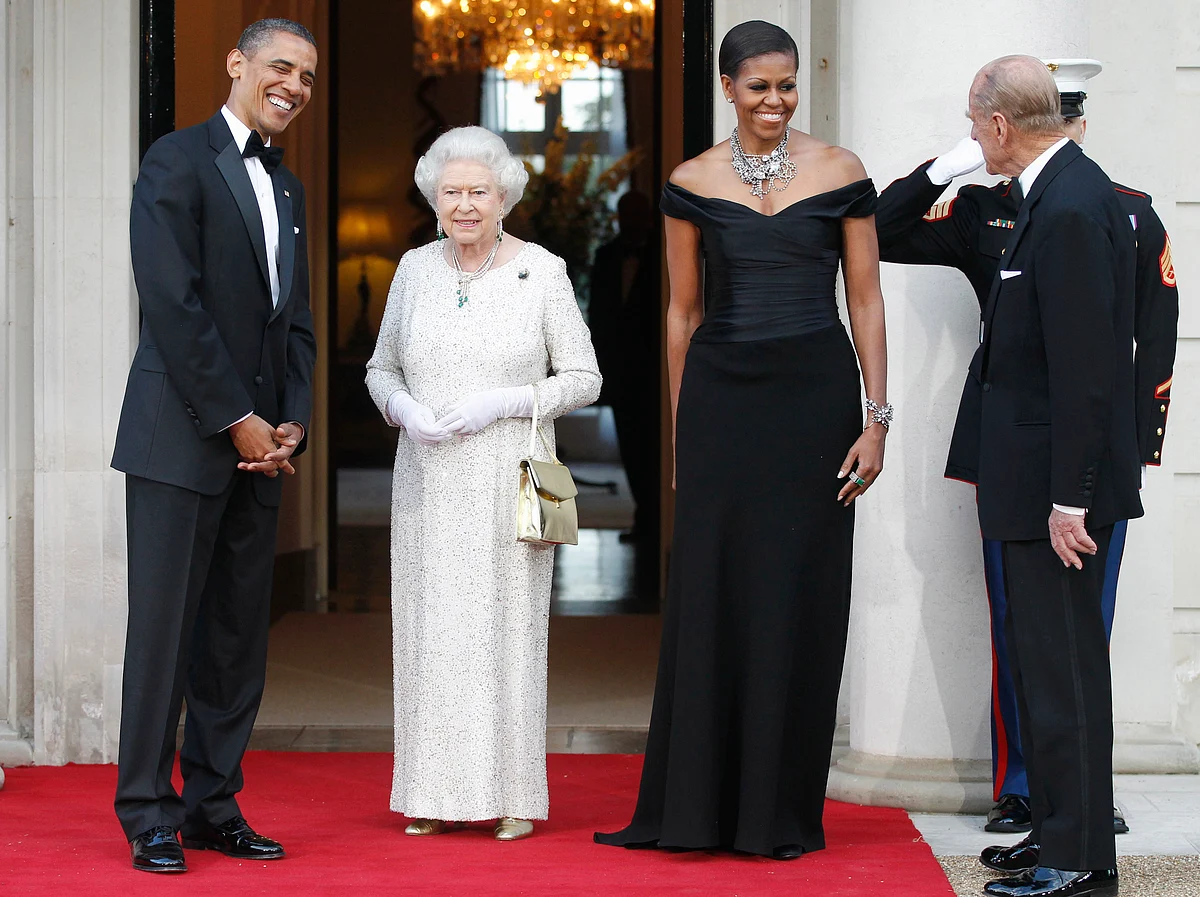 In this 25 May 2011, file photo, President Barack Obama and first lady Michelle Obama welcome Britain’s Queen Elizabeth II and Prince Philip for a reciprocal dinner at Winfield House in London. (Photo: AP)