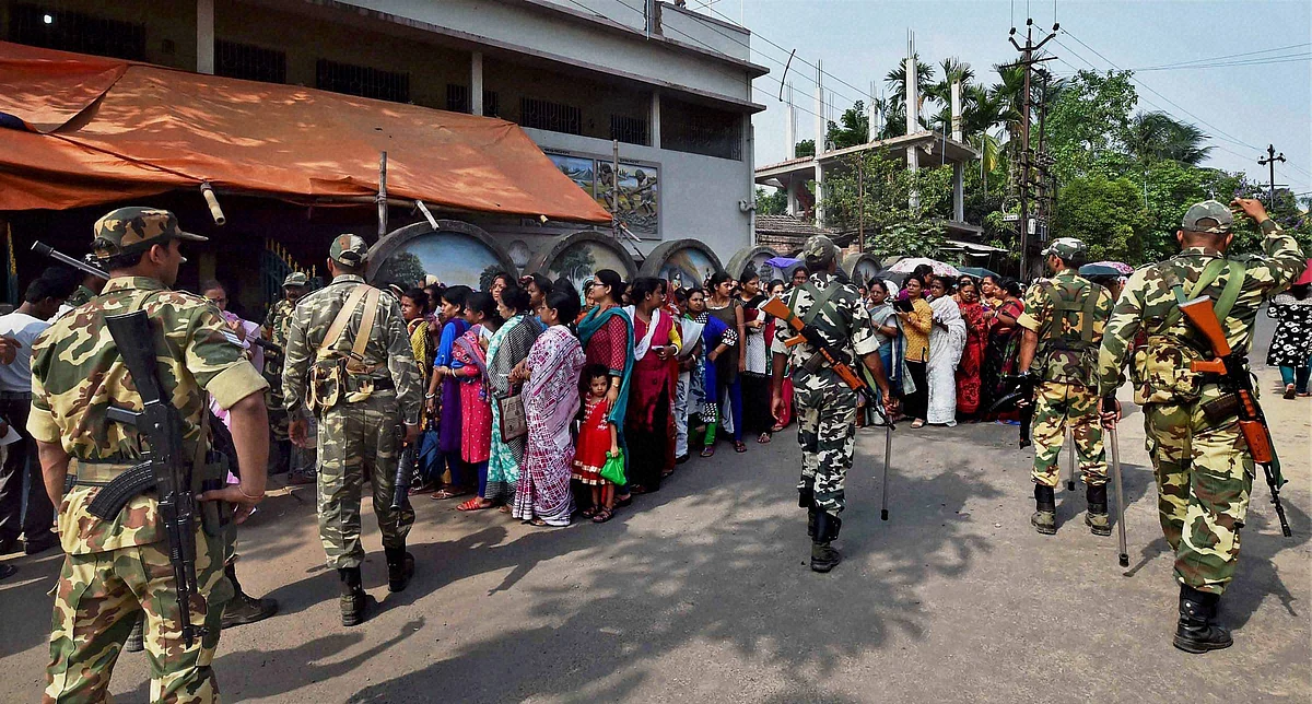 Security personals guarding a polling station. (Photo: PTI)