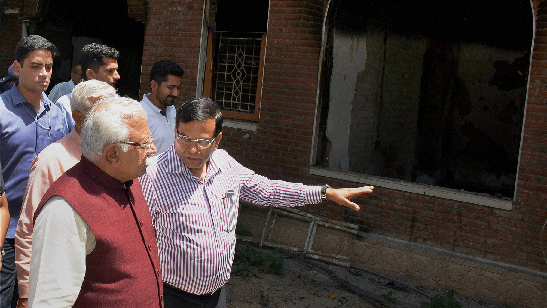 

Haryana Chief Minister ML Khattar visits the house of  Capt. Abhimanyu that was set on fire by some people during the agitation for reservation recently, in Rohtak on Monday. (Photo: PTI)